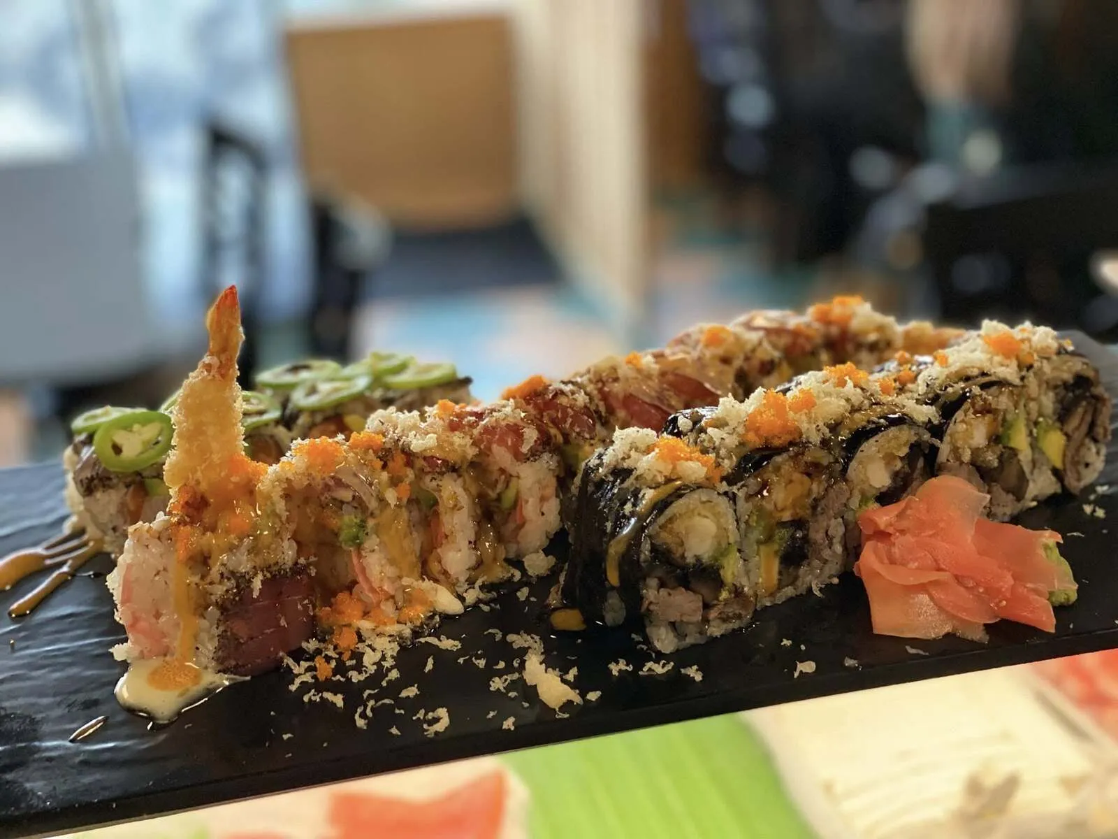 Specialty sushi rolls at Tougen