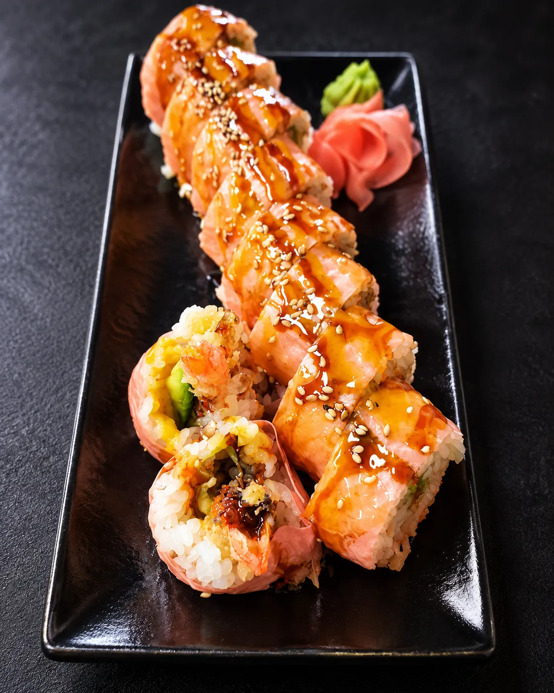 Salmon-topped specialty roll at Tougen