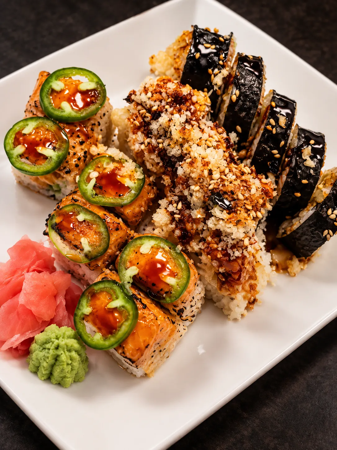 Jalapeno salmon roll and crunch rolls at Tougen
